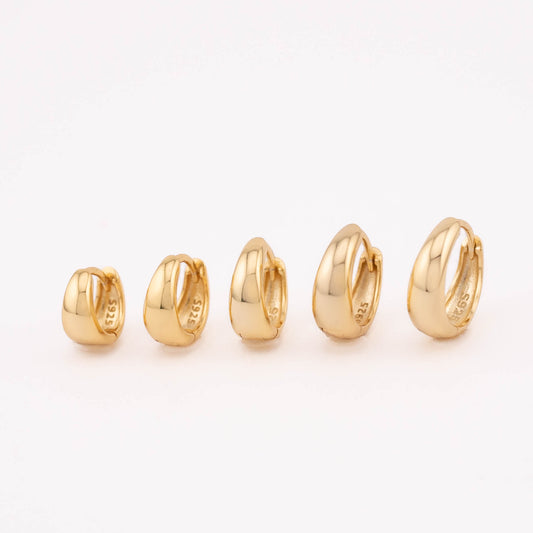 14K gold vermeil mini huggies (6mm-10mm) for men and women, neatly lined up in various sizes